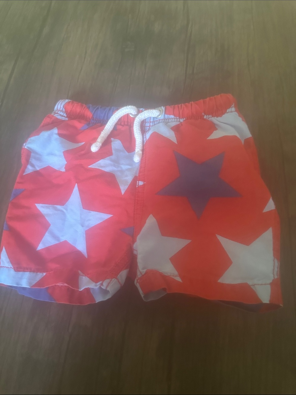 Baby Boden Red Star Swim Shorts with White Drawstring